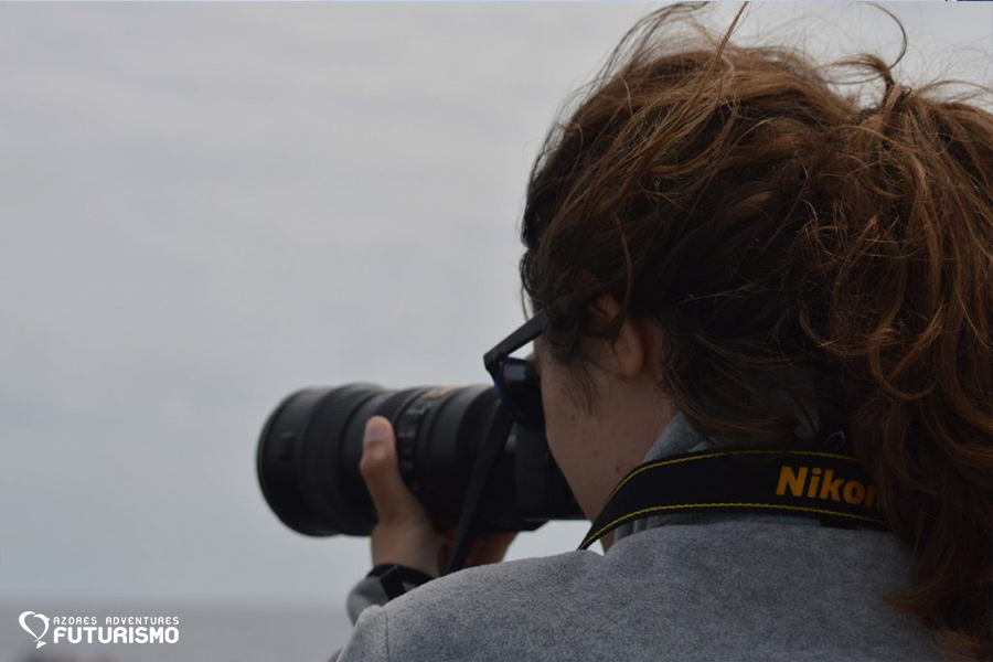 Georgina Cabayol taking pictures during whale watching tour